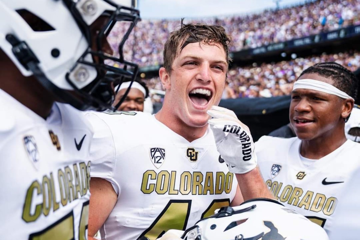 Trevor Woods smiling after 45-42 win at TCU